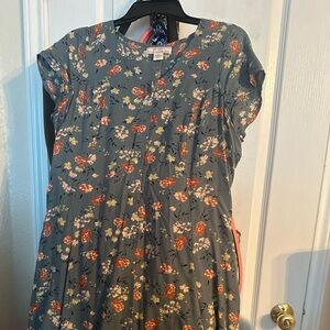 Summer flowy Dress brand is Band of Gypsies. Has pockets.